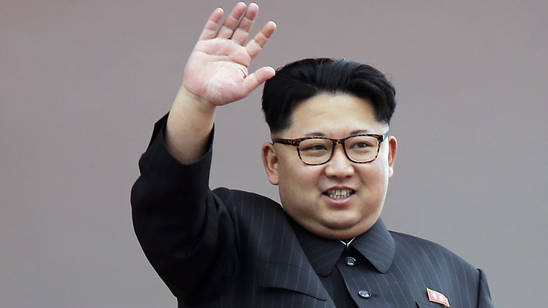 North Korean leader Kim Jong Un waves at parade participants at the Kim Il Sung Square on Tuesday, May 10, 2016, in Pyongyang, North Korea. Hundreds of thousands of North Koreans celebrated the country's newly completed ruling-party congress with a massive civilian parade featuring floats bearing patriotic slogans and marchers with flags and pompoms. (AP Photo/Wong Maye-E)